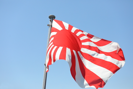 Japanese war flag Kyokujitsuki. Kyokujitsuki was used as an army flag since 1870.の写真素材