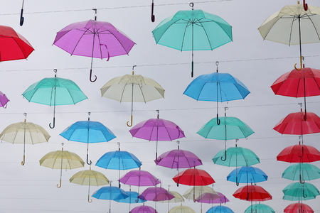 Colourful umbrella in skyの写真素材