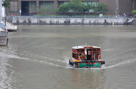 Singapore-November 17, 2018: Unidentified people take Singapore river cruise in Singapore.