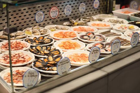 Madrid Spain - May 27, 2019: Spanish food tapas display at Mercado de San Miguel market Madrid Spainのeditorial素材