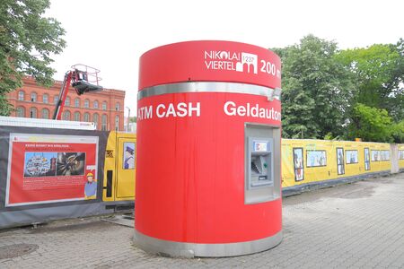 Berlin Germany - June 7, 2019: Cash machine ATM at Wasserkaskaden square plaza Berlin Germanyのeditorial素材