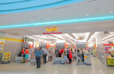 Berlin Germany - June 11, 2019: People visit Netto discount supermarket Berlin Germany