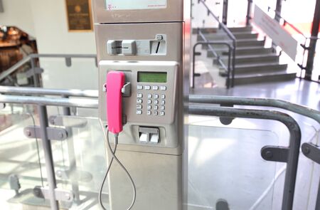 Berlin Germany - June 12, 2019: T mobile public pay phone B at Tegel airport Berlin Germanyのeditorial素材