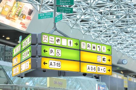 Berlin Germany - June 12, 2019: Direction information at Tegel airport Berlin Germanyのeditorial素材