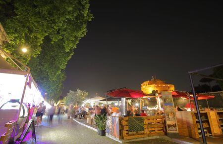 Rome Italy - June 16, 2019: People dine at restaurant on Tiber river bank Rome Italyのeditorial素材