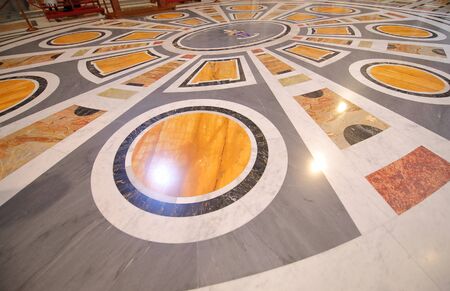 VATICAN CITY - JUNE 16, 2019: Marble floor design of St Peters basilica Vatican cityのeditorial素材