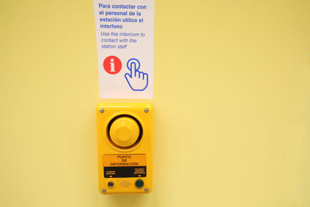 Madrid Spain - May 31, 2019: Emergency buzzer button to speak to train station staff Madrid Spain