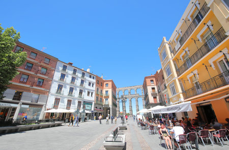 Segovia Spain - May 29, 2019: People visit Aqueduct historical architecture Roman ruin Segovia Spain