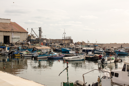 TEL AVIV, ISRAEL - May 19 2014: Still functional as a small fishing port - Old Jaffa Port, Mediterraneanのeditorial素材