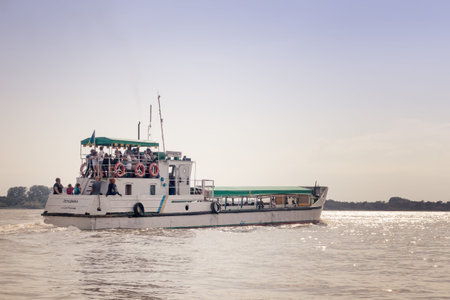 Vilkovo, Ukraine - May, 26, 2018: Pleasure boat with a group of tourists on the Danube River on a...