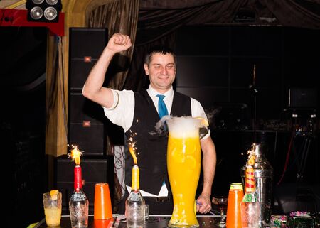 The process of making a cocktail at the bartenders show.のeditorial素材