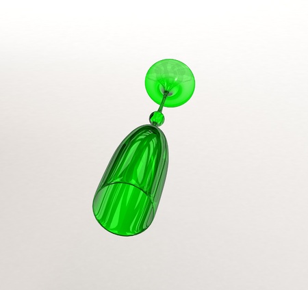 Green wineglass on white backgroundの写真素材