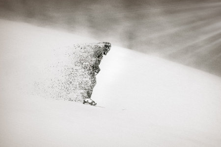 Snowshoeing in the mountains. Black and white photo.の写真素材