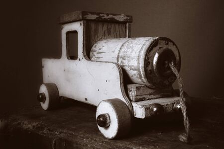 train toy vintage or old wooden locomotive. childs toy or decorative objectの写真素材