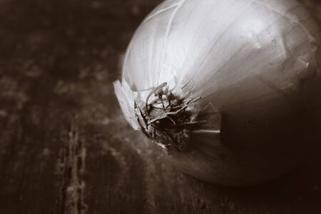 onion on rustic brown wood surface. healthy natural vegetableの写真素材