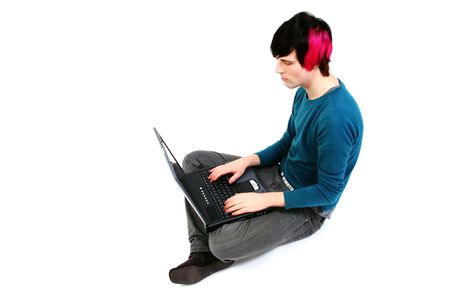 student with laptop. young adult with pc studying isolated on whiteの写真素材