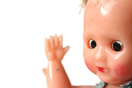 doll's head. childs vintage toy. baby doll isolated on whiteの写真素材