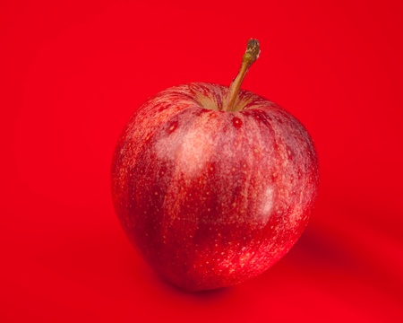 apple bright and vibrant with color background. healthy fruit in modern colourの写真素材