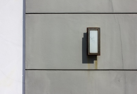 Classic lamp on the tiles wall with copy space for textの写真素材