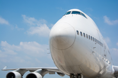 Passenger planes at the airport shoot on the busの写真素材