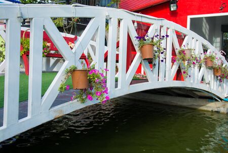 wooden Whiteflowerpot on bridge accentedの写真素材