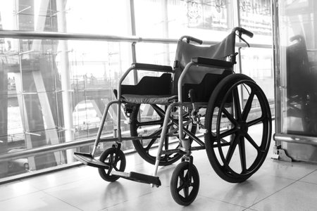 Black and white Wheelchair service in airport terminalのeditorial素材