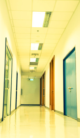 Hall of business building with light from window, vintage color styleの写真素材