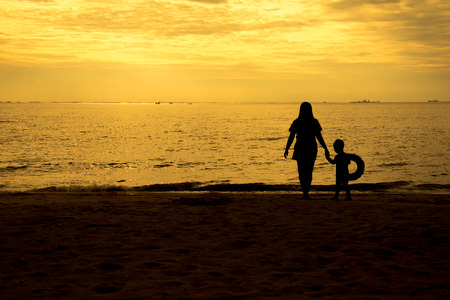 mother and son by on the seaの写真素材