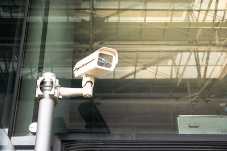 CCTV security camera front of modern building,