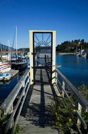 Locked door to a pierの写真素材