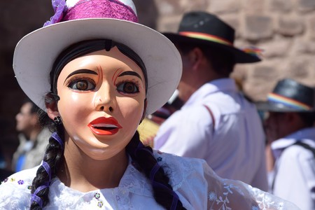 Intriguing mask of woman in street celebration in Cuzco, Peruのeditorial素材