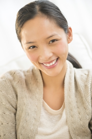 Close-up portrait of beautiful mid adult woman smilingの写真素材