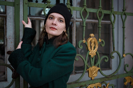 Portrait of a pretty woman in vintage autumn clothesの写真素材