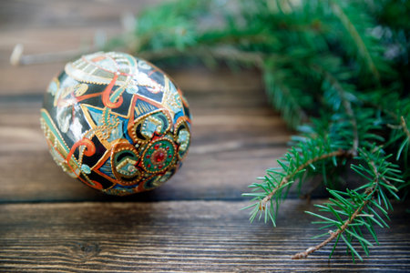 Easter egg on rustic wooden background. Selective soft focus