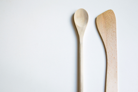 Wooden kitchen tools on white backgroundの写真素材