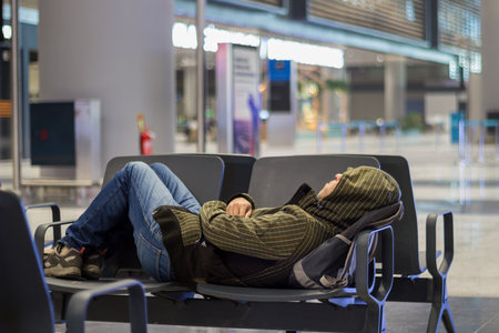 Young man at the airportの写真素材