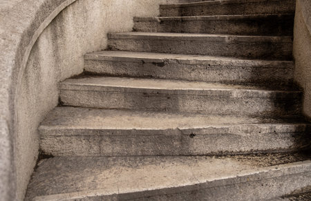 Old stone street spiral staircase, Retro style. Outdoor staircase