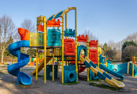 Colorful children playground park. Children's slides and playground made of plastic material