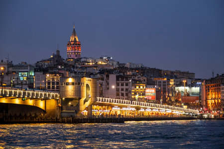 Istanbul landscape at night. Galata Bridge and Galata Tower seaside view