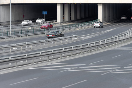 Vehicles driving on multi-lane highway. Road transport and travel concept. car traffic on tunnel