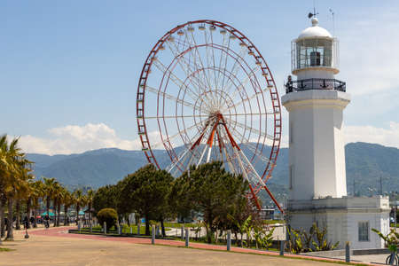 Batumi, Georgia - May 15 2022: General view of Batumi city center and sea shore on a sunny summer day. tourist destination. Batumi Ferris Wheel and Lighthouseのeditorial素材