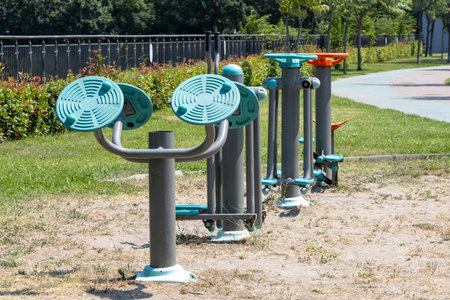 Conditioning and sports equipment in the public park outdoors.