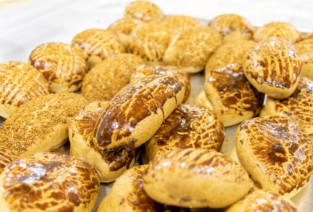 Hot and fresh pastry in a tray. English name: Pogaca