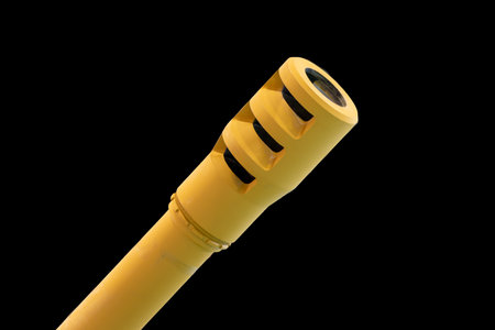 Tank gun barrel isolated black backgroundの写真素材
