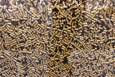 A pile of empty bullet casingsの写真素材
