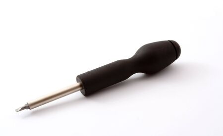 screwdriver with a replaceable tip on a white backgroundの写真素材