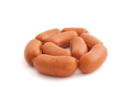 Fresh pork sausage on a white backgroundの写真素材