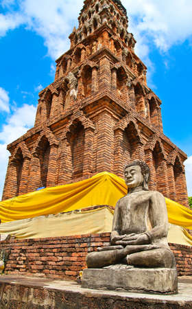 Pagoda and Buddha statue in North Thailandの写真素材