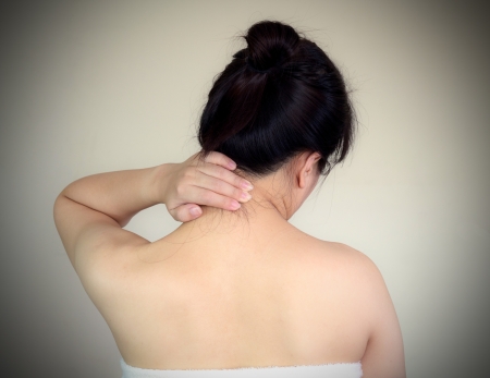 Neck pain exercise or hard work  Should rest の写真素材