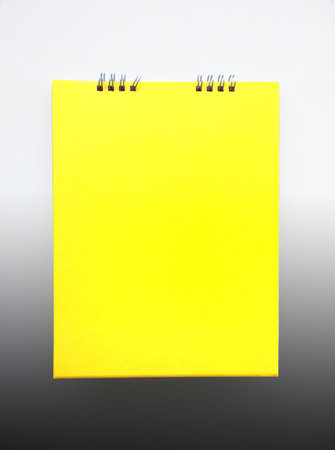 Yellow book. Yellow desktop Calendar. Isolated yellow book